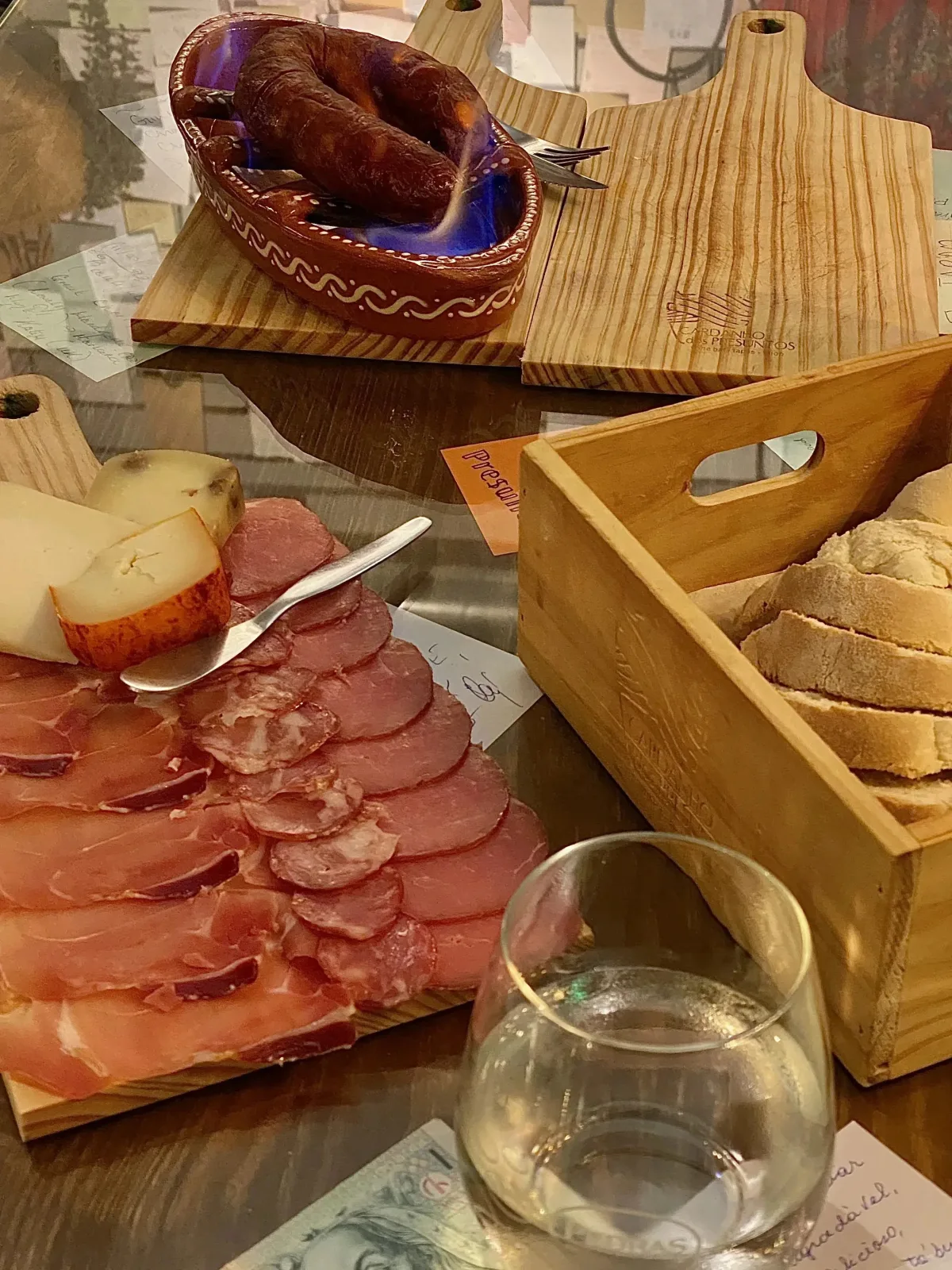 flaming chorizo and a meat+cheese platter